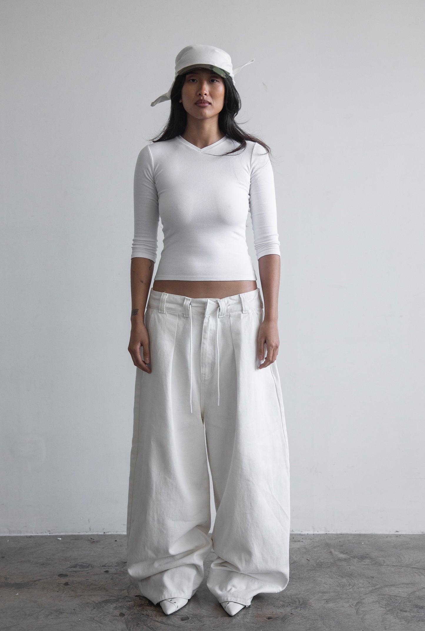 off-white oversized pants with camo hem 